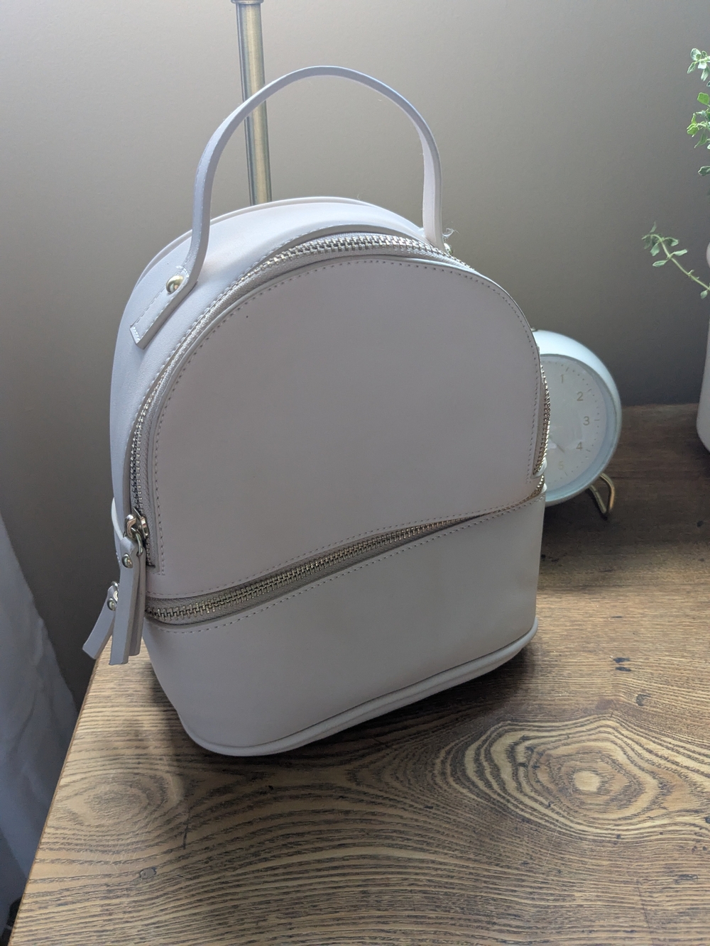 Compact White Women's Mini Backpack with Gold Zippers